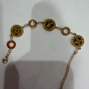 Elegant Gold and Green Bracelet